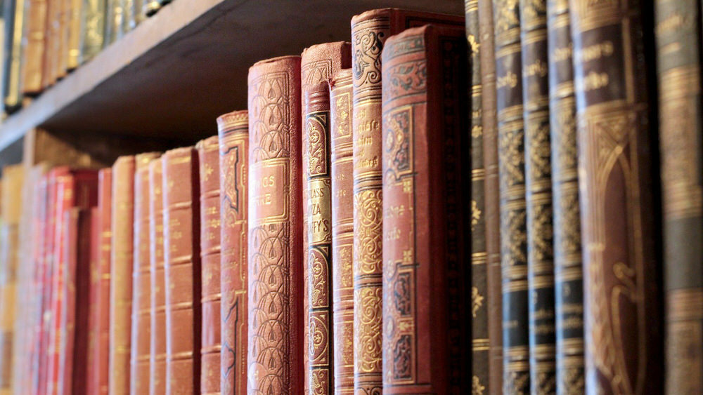 Ornate books on a shelf
